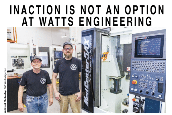 photo of two men and a CNC machine